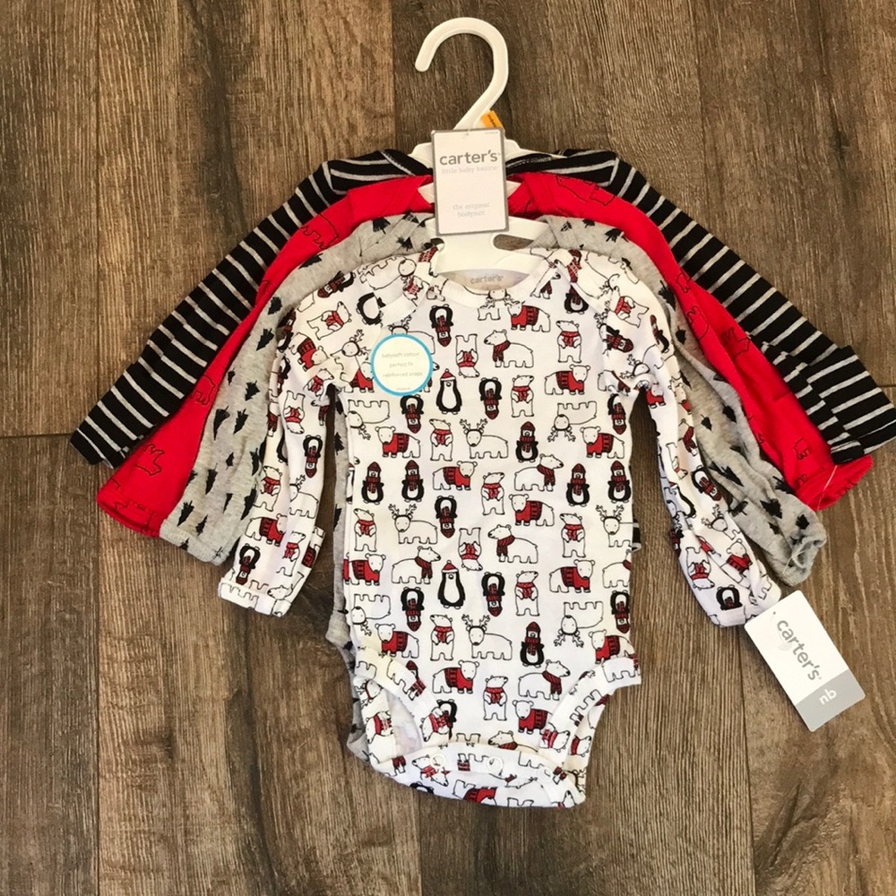 Carter’s Christmas/winter NB onesies set of 4